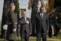 Ukrainian Defense Minister Andriy Taran and U.S. Defense Secretary Lloyd Austin, right, attend a welcome ceremony ahead of their meeting in Kyiv, Ukraine, Tuesday, Oct. 19, 2021. (Gleb Garanich/Pool Photo via AP)