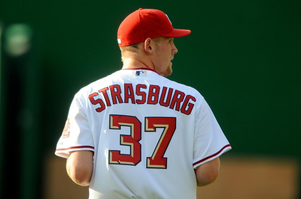 Washington Nationals starter Stephen Strasburg warms up before a game against the Pittsburgh Pirates on June 8, 2010, in Washington, D.C.