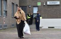 Residents are evacuated from the Dorney Tower residential block as a precautionary measure following concerns over the type of cladding used on the outside of the building on the Chalcots Estate in north London, Britain, June 24, 2017. REUTERS/Hannah McKay