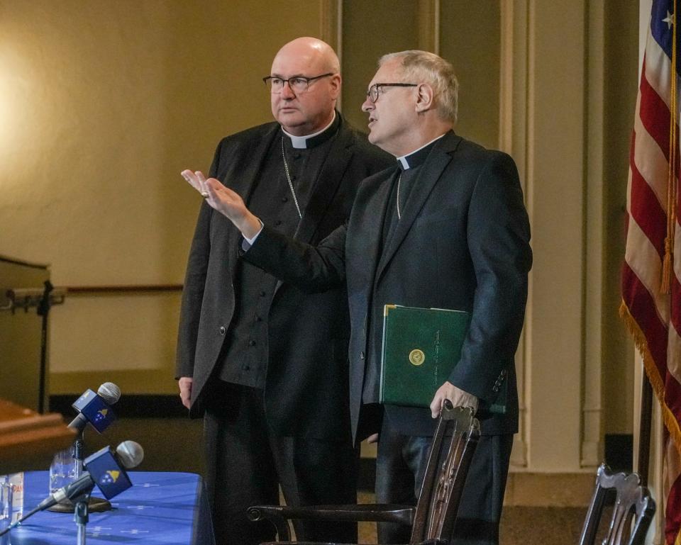 Bishop Richard Henning, left, served as coadjutor bishop in the Diocese of Providence until Monday, when the retirement of his predecessor, Thomas J. Tobin, right, became official. Unlike Tobin, Henning said he has no intention of making spiritual pronouncements on Twitter.