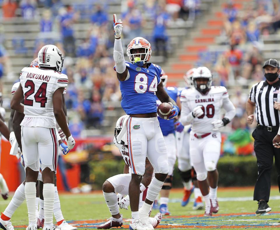Florida tight end Kyle Pits (84) signals a first down after making a catch against South Carolina during an NCAA college football game in Gainesville, Fla., Saturday, Oct. 3, 2020. (Brad McClenny/The Gainesville Sun via AP, Pool)