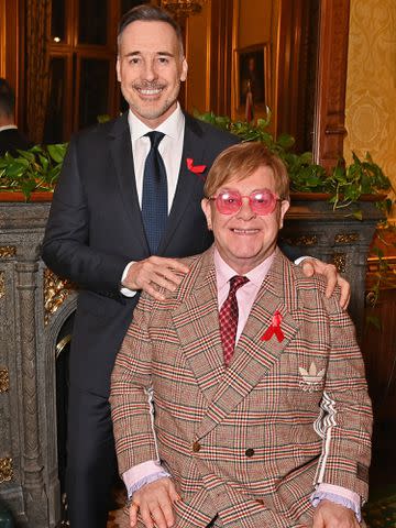 <p>Dave Benett/Getty</p> David Furnish (left) and Elton John in London in November 2023