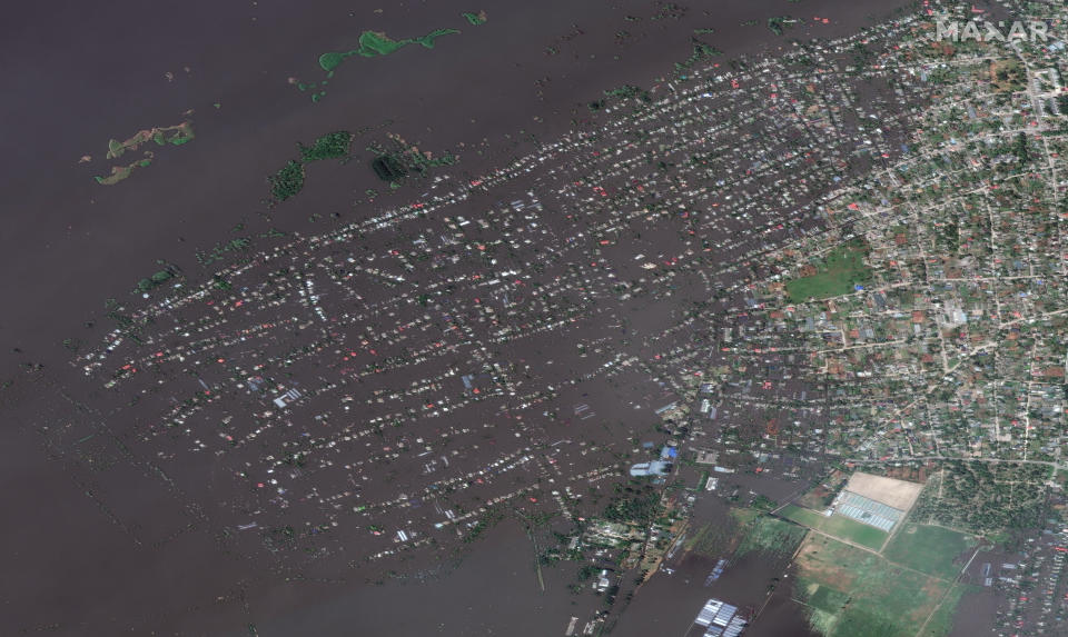 Russia-held Kherson town Oleshky seen fully submerged under flooding water where people have complained of loss of electricity supply and fires (Satellite image ©2023 Maxar Technologies.)