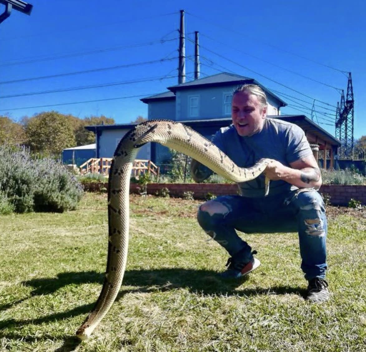 Barczyk with a bushmaster snake, or pit viper