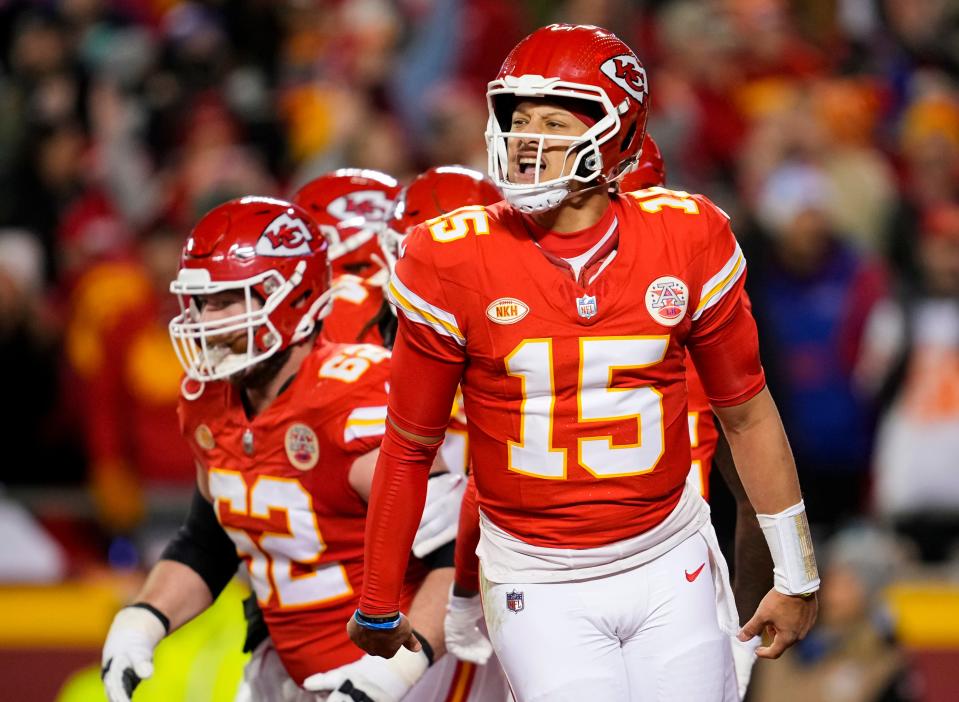 Kansas City Chiefs quarterback Patrick Mahomes (15) celebrates after a touchdown during the second half against the Buffalo Bills at GEHA Field at Arrowhead Stadium.