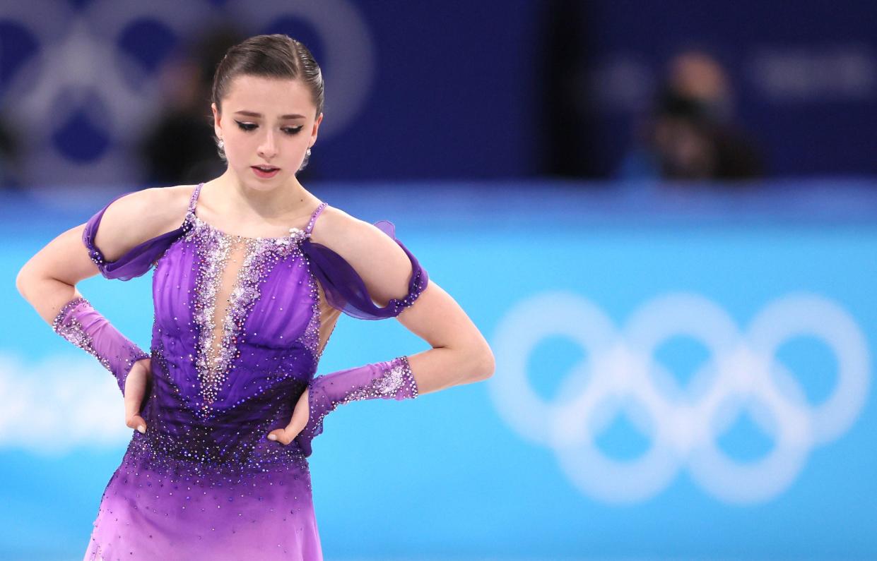 Russia's Kamila Valieva reacts after competing in the women's singles short program at the 2022 Beijing Olympics.