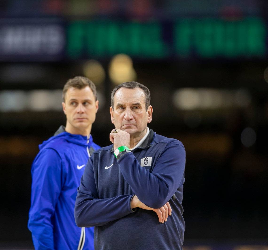 Duke coach Mike Krzyzewski and associate head coach Jon Scheyer watch their players during the Blue Devils’ open practice at the NCAA Final Four on Friday, April 1, 2022 at Caesars Superdome in New Orleans, La.