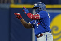 Toronto Blue Jays' Vladimir Guerrero Jr. celebrates his double off Tampa Bay Rays' Drew Rasmussen during the fourth inning of a baseball game Tuesday, Sept. 21, 2021, in St. Petersburg, Fla. (AP Photo/Chris O'Meara)