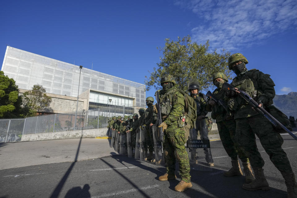 Soldiers guard the National Assembly in Quito, Ecuador, Wednesday, May 17, 2023. Ecuadorian President Guillermo Lasso on Wednesday put an end to impeachment proceedings against him by dissolving the opposition-led National Assembly, which had accused him of embezzlement. (AP Photo/Dolores Ochoa)