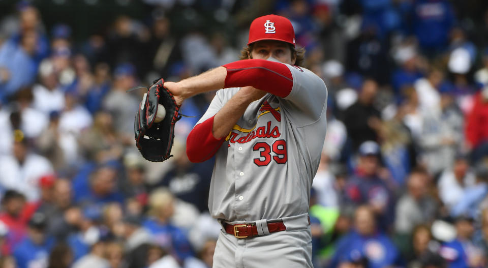 St. Louis Cardinals starting pitcher Miles Mikolas (39) wipes his face after Chicago Cubs' Ben Zobrist scored in the first inning of a baseball game on Saturday, Sept. 29, 2018, in Chicago. (AP Photo/Matt Marton)