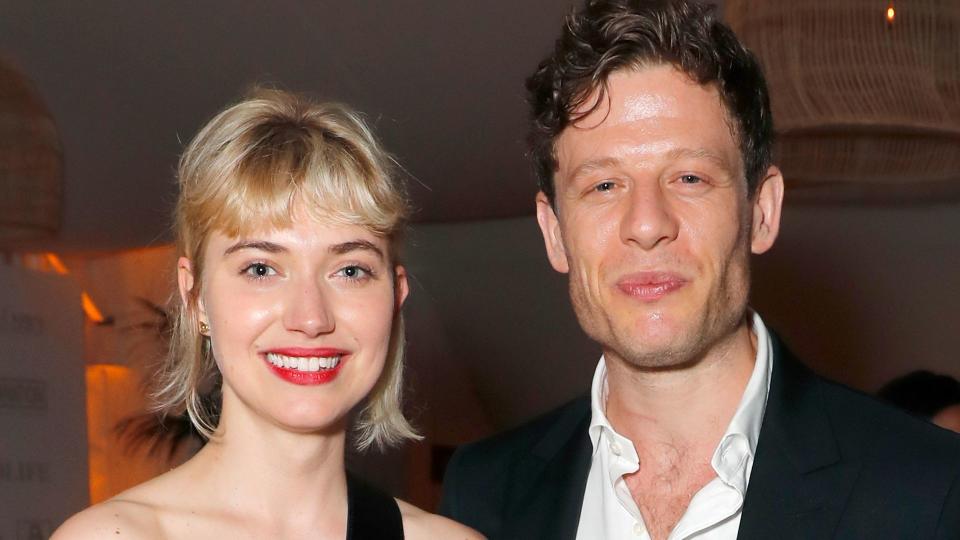 Imogen Poots in a striped dress with James Norton in a black suit