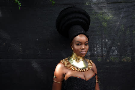 Kristia Tolode, 24, an influencer and model, poses for a portrait wearing a piece by Moshoodat in the Brooklyn borough of New York, U.S., August 25, 2018. REUTERS/Caitlin Ochs