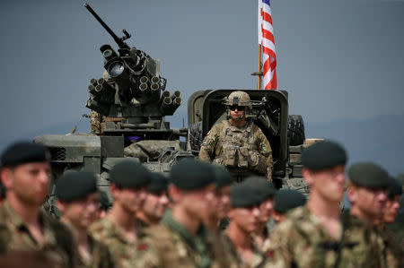 U.S. and British servicemen attend an opening ceremony of the NATO-led military exercises "Noble Partner 2018" at Vaziani military base outside Tbilisi, Georgia, August 1, 2018. REUTERS/David Mdzinarishvili