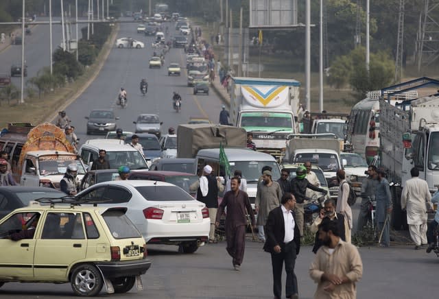 Protesters block a main road in Islamabad