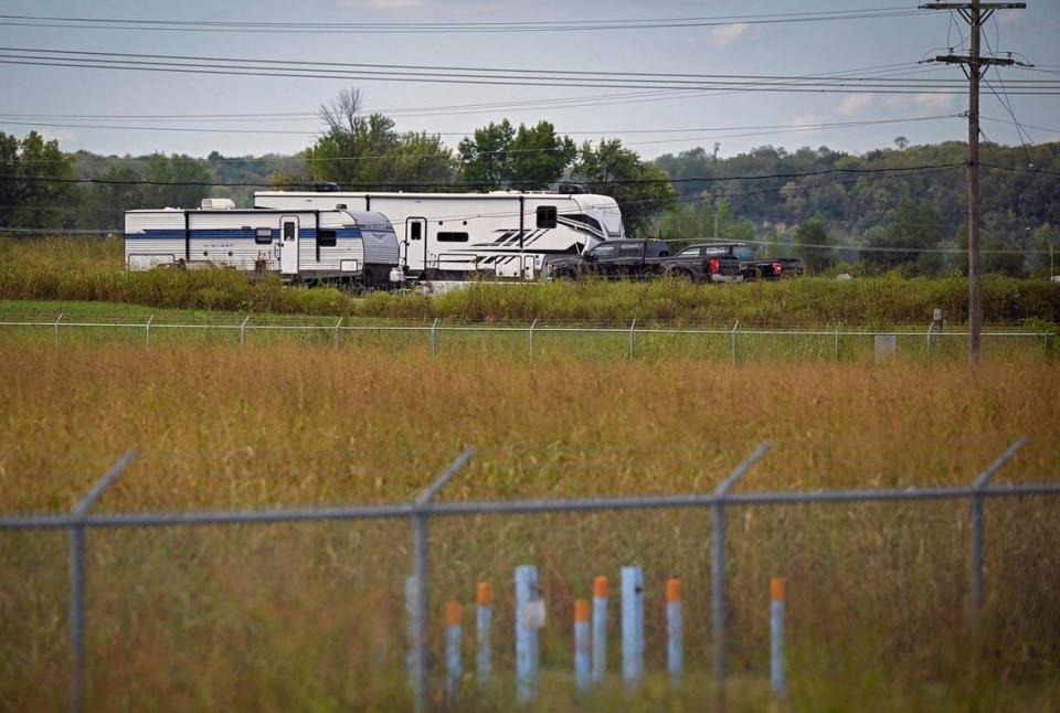 Two trailers sit across the highway from the site of the Smokey River Entertainment District in River Bend. This is the area where two village board members reported living, according to documents obtained by The Star.