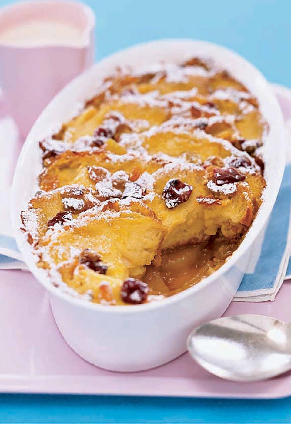 <p>This warm, decant bread pudding gets a bit of bite from the lemon.<br></p><p><a rel="nofollow noopener" href="https://www.womansday.com/food-recipes/food-drinks/recipes/a9857/apple-lemon-bread-pudding-121230/" target="_blank" data-ylk="slk:Get the recipe.;elm:context_link;itc:0;sec:content-canvas" class="link "><strong>Get the recipe.</strong></a></p>