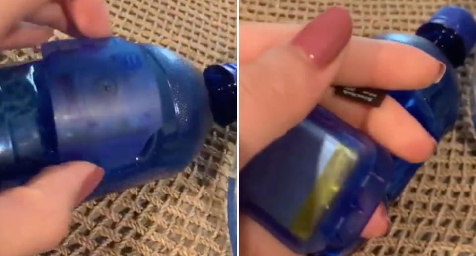 A panel is removed from a water bottle which appears to contain a hidden camera. Inside the panel is a SD memory card.