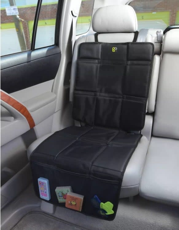 an image of a car seat protector with pockets that helps shield seat upholstery from spills and scuffs