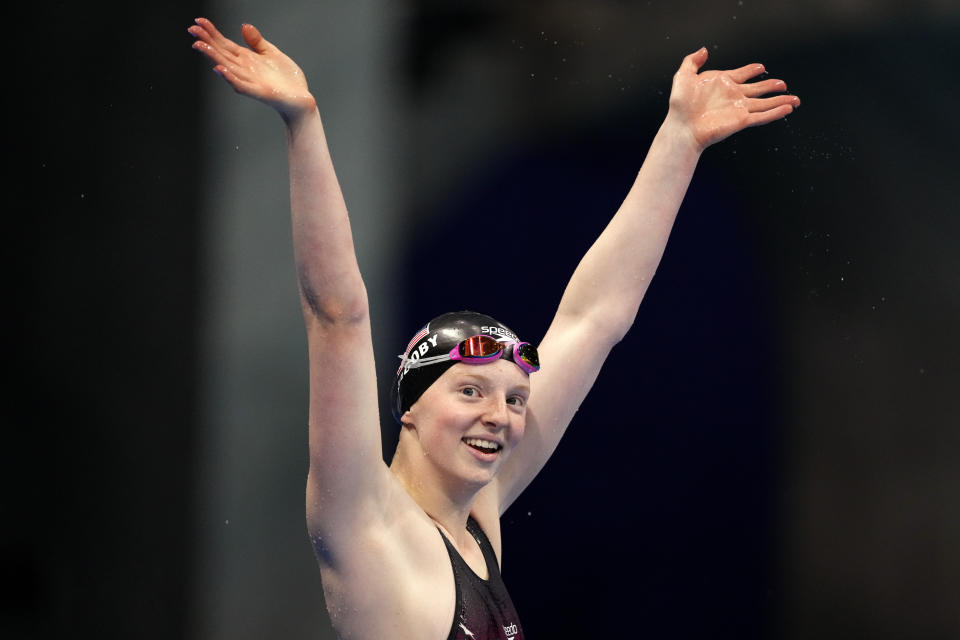 Lydia Jacoby of the United States waves after winning the final of the women's 100-meter breaststroke at the 2020 Summer Olympics, Tuesday, July 27, 2021, in Tokyo, Japan. (AP Photo/Matthias Schrader)