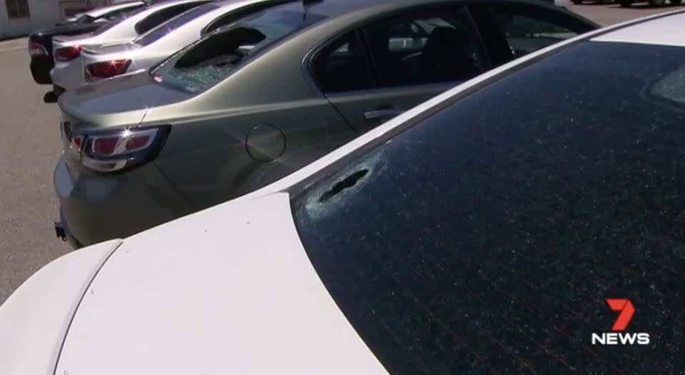 On the same night cars at a Mandurah car yard had their windows smashed. Source: 7 News