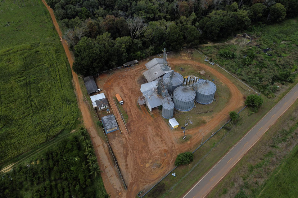 Grain silos for the rural producers cooperative Cooperopcao stands near the Interoceanic Highway BR-317, in the Senador Guiomar municipality, near the city of Rio Branco, Acre state, Brazil, Wednesday, May 24, 2023. (AP Photo/Eraldo Peres)