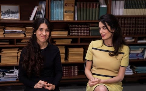 Yazidi survivor Nadia Murad takes part in an interview with international human rights lawyer Amal Clooney at United Nations headquarters in New York - Credit: Reuters
