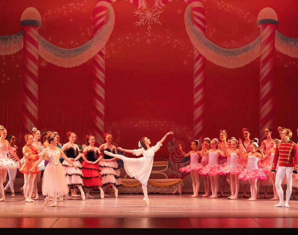 Maddie Jacobs as Clara and dancers in Act 2 of Alabama River Region Ballet's "The Nutcracker".