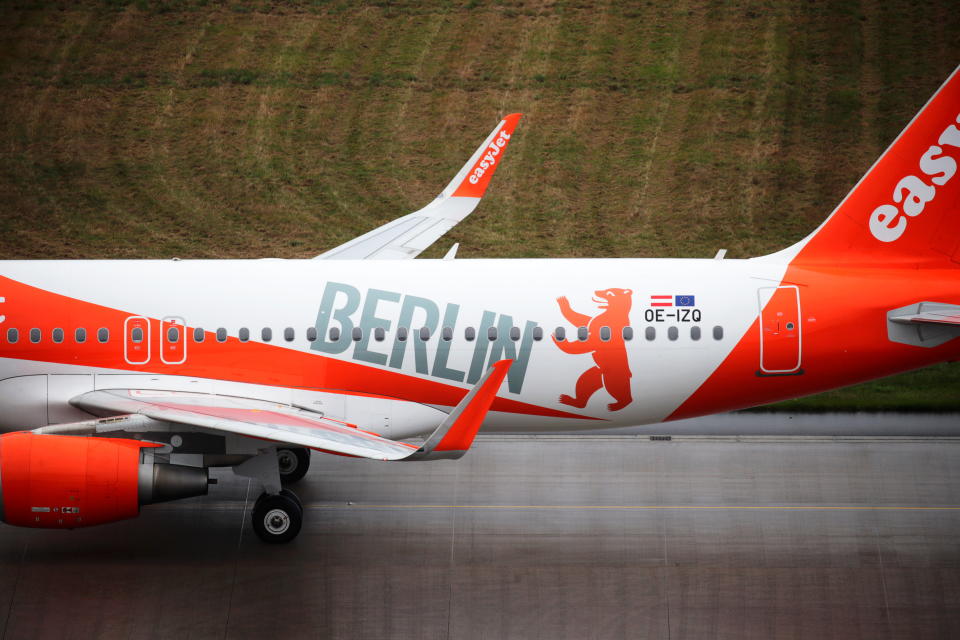 An EasyJet aircraft is seen on the tarmac at Terminal 1, marking the official opening of the new Berlin-Brandenburg Airport (BER) "Willy Brandt", in Schoenefeld near Berlin, Germany October 31, 2020. REUTERS/Hannibal Hanschke/Pool