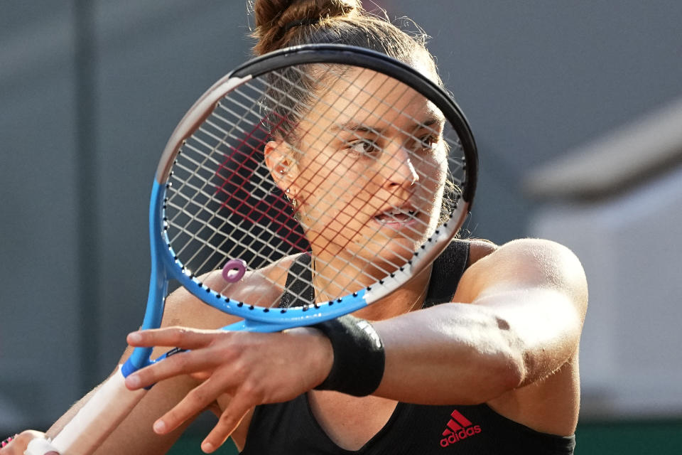 FILE - Maria Sakkari of Greece returns the ball to Czech Republic's Barbora Krejcikova during their semifinal match of the French Open tennis tournament at the Roland Garros stadium Thursday, June 10, 2021 in Paris. The new Netflix docuseries about professional tennis is launching shortly before the start of the Australian Open. Sakkari says in Episode 3 that she “retired for four days” after blowing a match point and losing in the 2021 French Open semifinals. (AP Photo/Michel Euler, File)