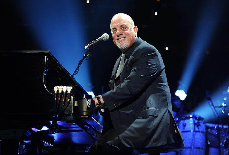 billy playing piano on stage