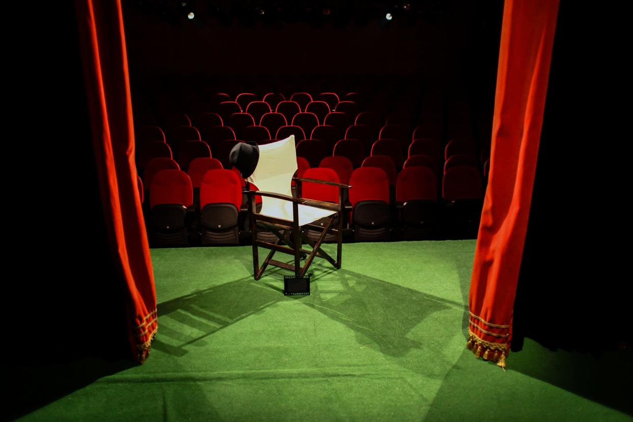 A director's chair sits on an empty stage. Mid-Missouri theaters will be brimming with new life and old standbys this summer.