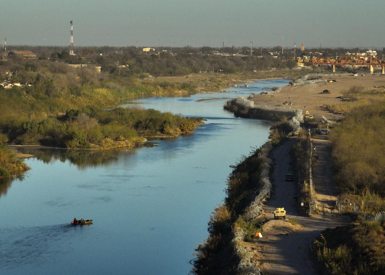 Texas National Guard soldiers patrol the banks of the Rio Grande in Eagle Pass last month.