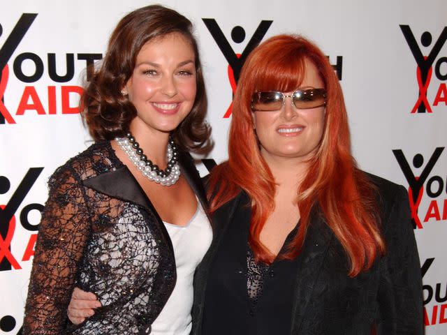 <p>Brian ZAK/Gamma-Rapho/Getty</p> Ashley Judd and Wynonna Judd arrive to the Youth Aids Benefit held at Capitale, New York City.