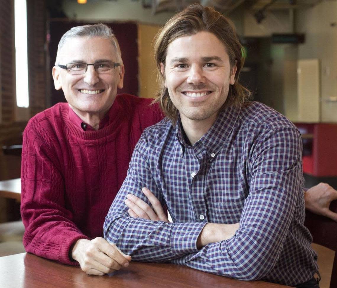 Dan Price in 2014 with his father, Ron Price, a well-known business speaker and consultant in Nampa, Idaho.