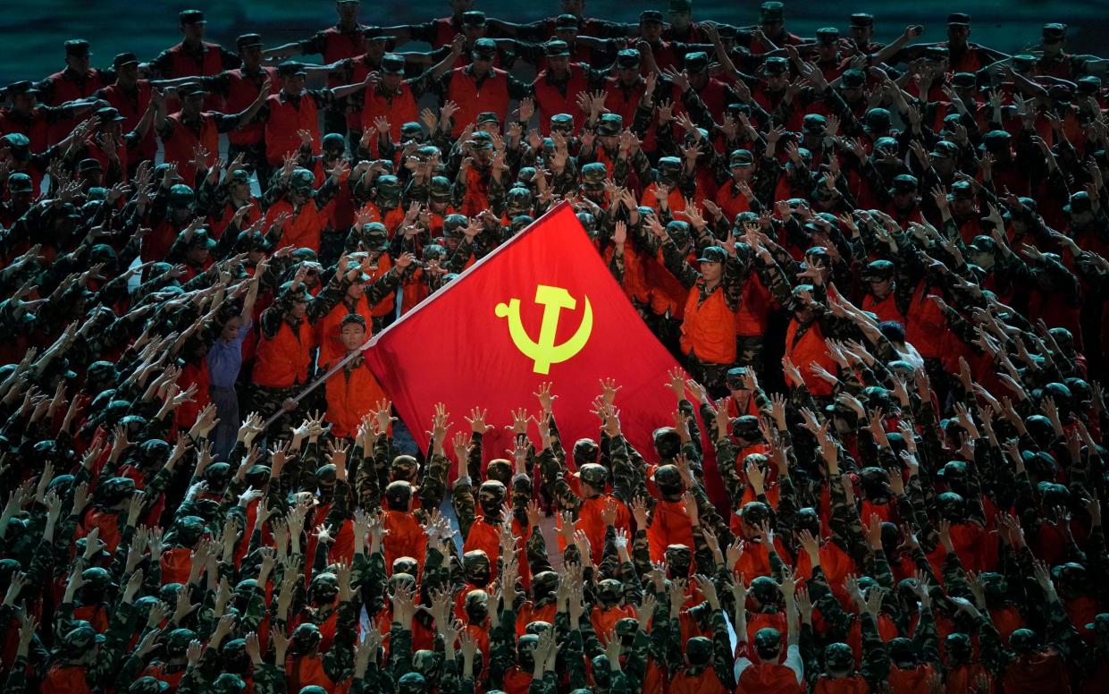 A scene from a gala show in Beijing ahead of the 100th anniversary of the founding of the Chinese Communist Party. - Ng Han Guan /AP