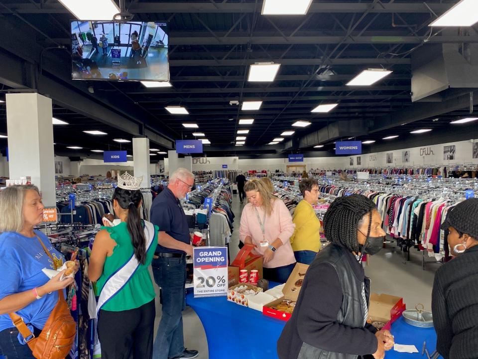 Discount Fashion Warehouse in the Appleseed Shopping Center on Lexington Avenue Friday celebrated a grand, re-opening with Richland Area Chamber-Economic Development members. The store offers discounted, name brand apparel and shoes for men, women and children.