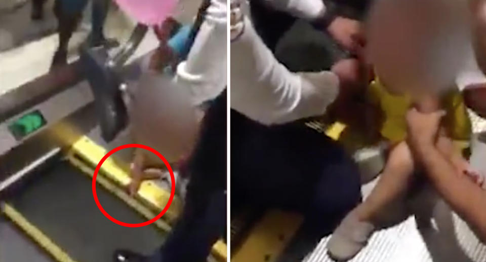 The girl can be seen with her fingers trapped in the escalator’s steps. Source: Facebook/ The Philippines News