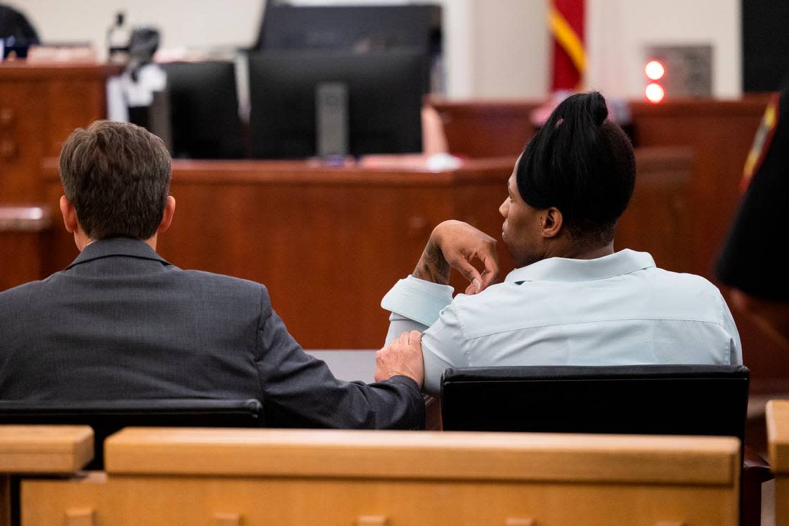 Attorney Patrick Curran touches Timothy Huff’s arm as the sentence is read in the trial Wednesday, June 29, 2022, at the Tim Curry Courthouse in downtown Fort Worth.