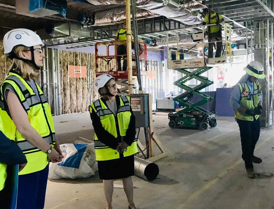 Maryland Comptroller Brooke Lierman, left, and inaugural Dean Paula Gregory of the Meritus School of Osteopathic Medicine tour the D.M. Bowman Academic Hall, under construction on the Meritus campus near Hagerstown.