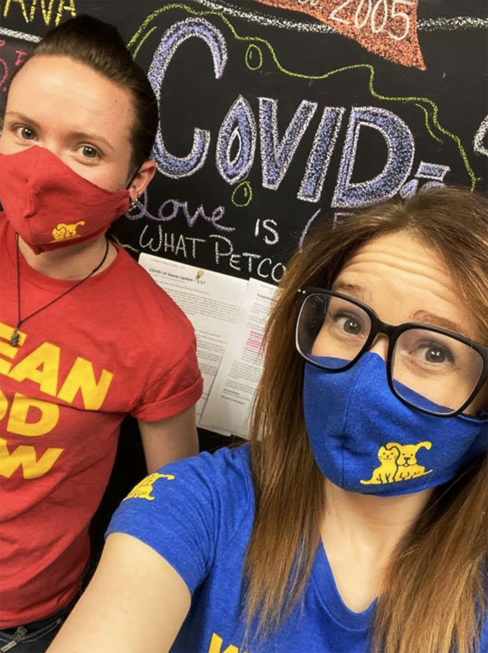 Petco employees wearing masks sewn from old uniforms. (Photo: Petco)