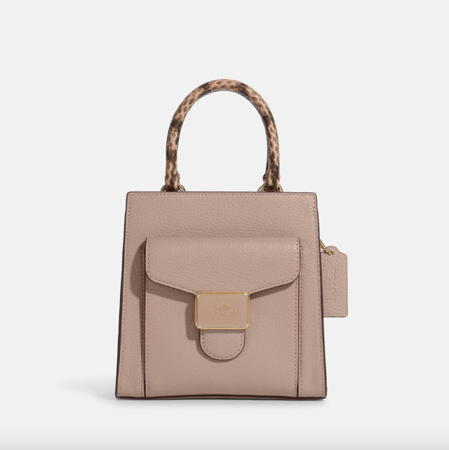 Coach Outlet Mini Pepper Crossbody in Gold/Shell Pink (Photo via Coach Outlet)