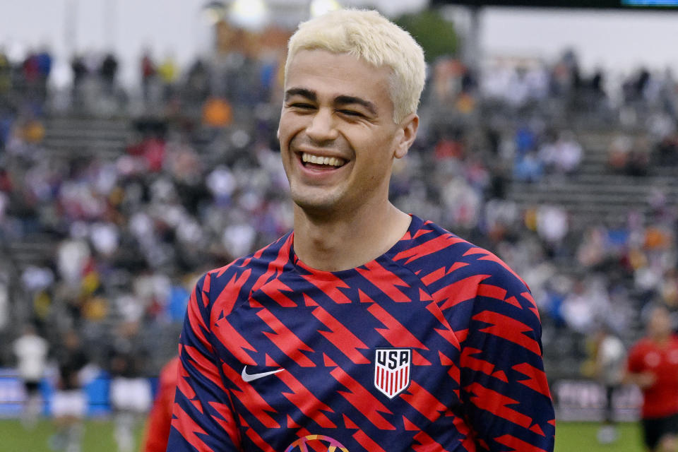 United States' Gio Reyna smiles as he warms up before an international friendly soccer match against Germany at Pratt & Whitney Stadium at Rentschler Field, Saturday, Oct. 14, 2023, in East Hartford, Conn. (AP Photo/Jessica Hill)