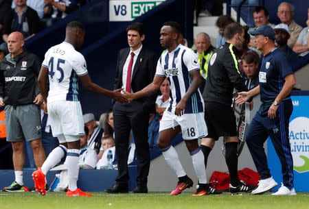 Football Soccer Britain - West Bromwich Albion v Middlesbrough - Premier League - The Hawthorns - 28/8/16 West Bromwich Albion's Saido Berahino comes on as a substitute to replace Jonathan Leko as West Bromwich Albion manager Tony Pulis and Middlesbrough manager Aitor Karanka look on Action Images via Reuters / John Sibley Livepic