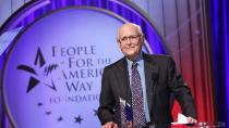 <p>In 1980, Lear pressed pause on his television career and created People for the American Way, a non-profit designed to "educate, energize, and equip Americans to build a country that more fully reflects the values of freedom, fairness, and opportunity in a diverse democratic society," <a href="http://www.normanlear.com/citizenship/" rel="nofollow noopener" target="_blank" data-ylk="slk:according to its website;elm:context_link;itc:0;sec:content-canvas" class="link ">according to its website</a>. The organization was formed in part to push back on the "divisive rhetoric of newly politicized televangelists," per Lear's bio.</p> <p>As part of his work with PFAW, Lear produced an influential, star-studded political television special, <i>I Love Liberty,</i> in 1982. Though he continued to write and produce through the later '80s and '90s, the pace of his work slowed. </p>