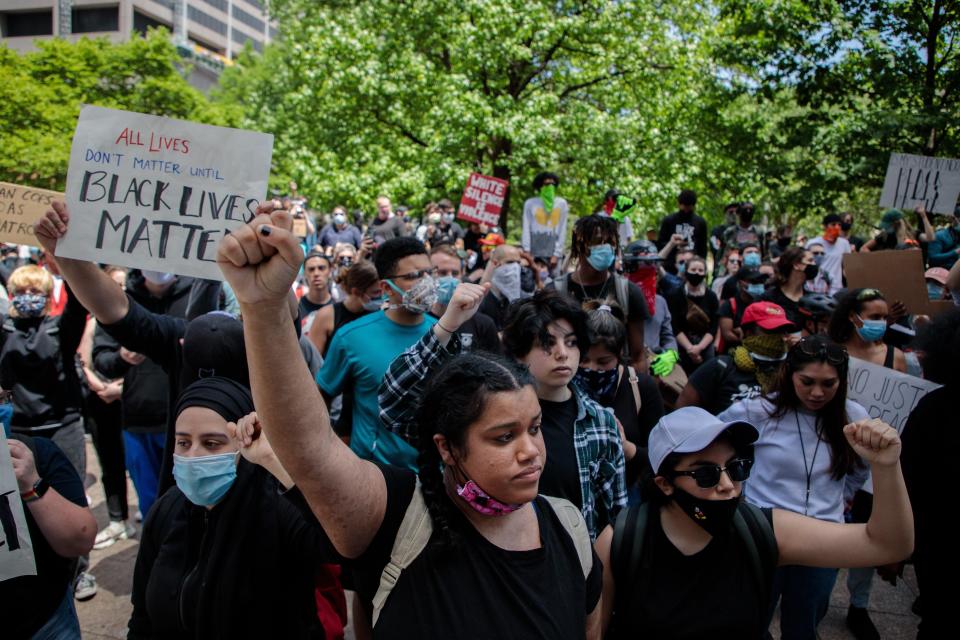 Adrianna Campbell, 16, center, raises her fist Monday in Columbus, Ohio, as protests continue following the death of Minneapolis resident George Floyd. Floyd, a 46-year-old black man, was killed while in police custody after allegedly passing a counterfeit $20 bill at a convenience store.