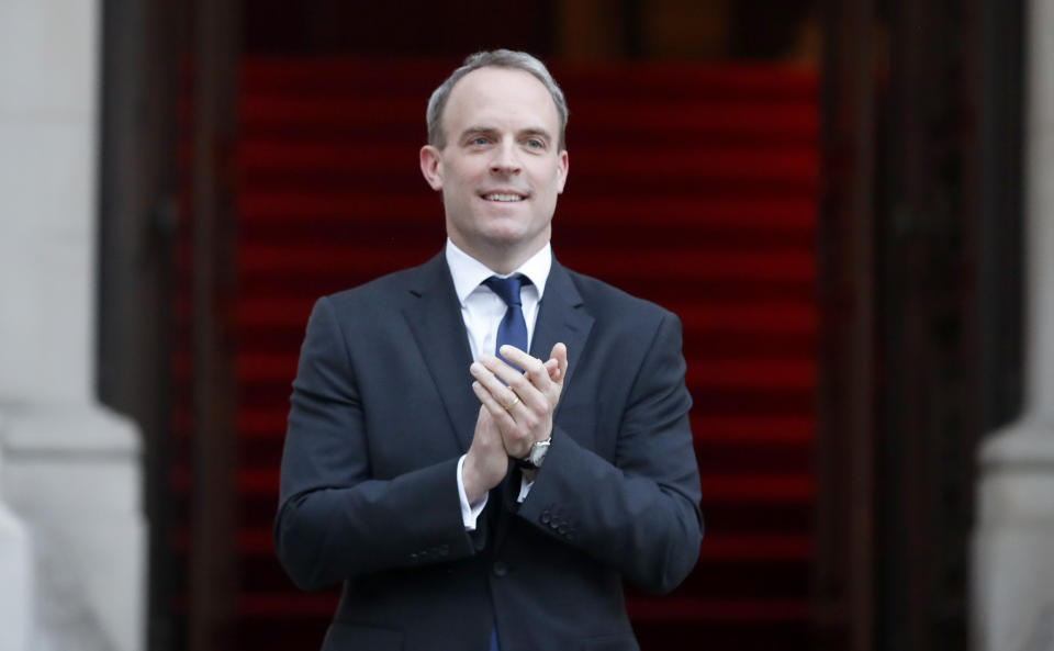 Foreign Secretary Dominic Raab clapping outside the Foreign and Commonwealth Office in London to salute local heroes during Thursday's nationwide Clap for Carers initiative to recognise and support NHS workers and carers fighting the coronavirus pandemic. PA Photo. Picture date: Thursday April 23, 2020. See PA story HEALTH Coronavirus. Photo credit should read: Frank Augstein/PA Wire