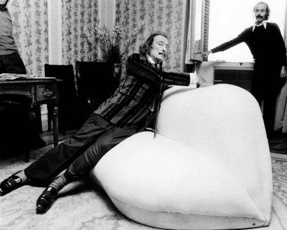 Dali on his famous red-satin sofa which he called ‘Mae West Lips’ (AFP/Getty)