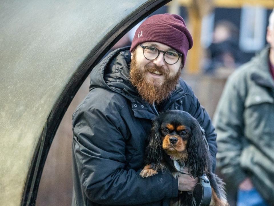 Jack Sargeant with his dog, Coco. Both were attacked by two Staffordshire bull terriers in a park in Cardiff (Jack Sargeant)