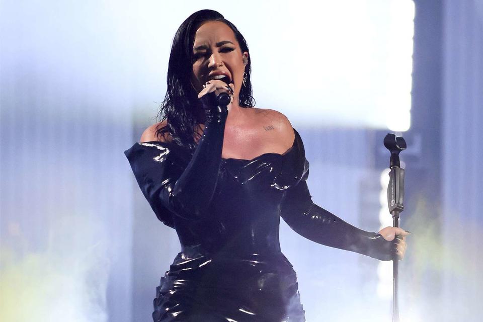 <p>Theo Wargo/Getty</p> Demi Lovato performing at the 2023 MTV VMAs