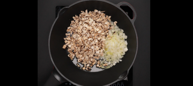 Fry the chopped yellow onions and mushroom together